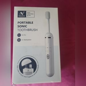 NIB portable sonic toothbrush